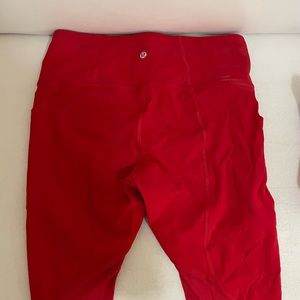 Red Lululemon leggings with pockets